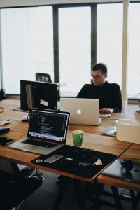 man-behind-computers