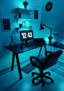 black-flat-screen-computer-monitor-on-black-wooden-table-3937174