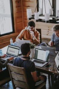 people discussing coffee shop meeting
